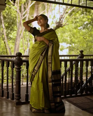Radiant Mehndi Soft Silk Saree With Devastating Blouse Piece